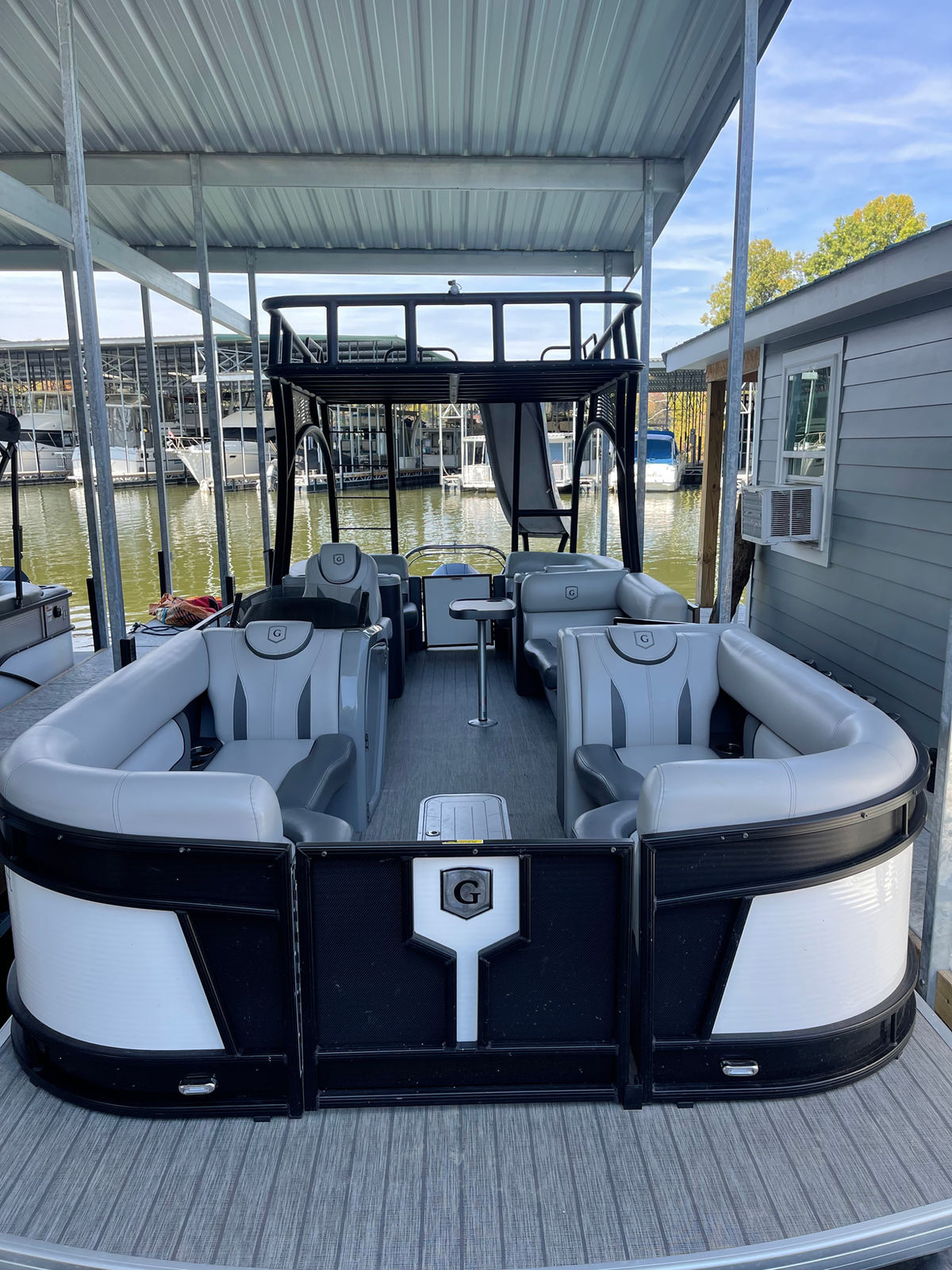 Duo double-decker Monaco Sundeck at Gallatin Marina, photographed from the bow