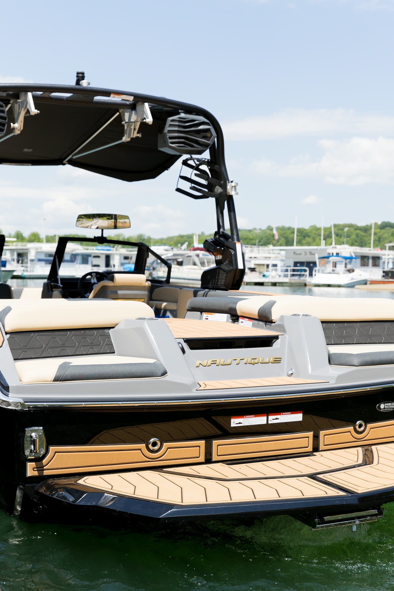 The rear deck and transom of a club boat at the dock